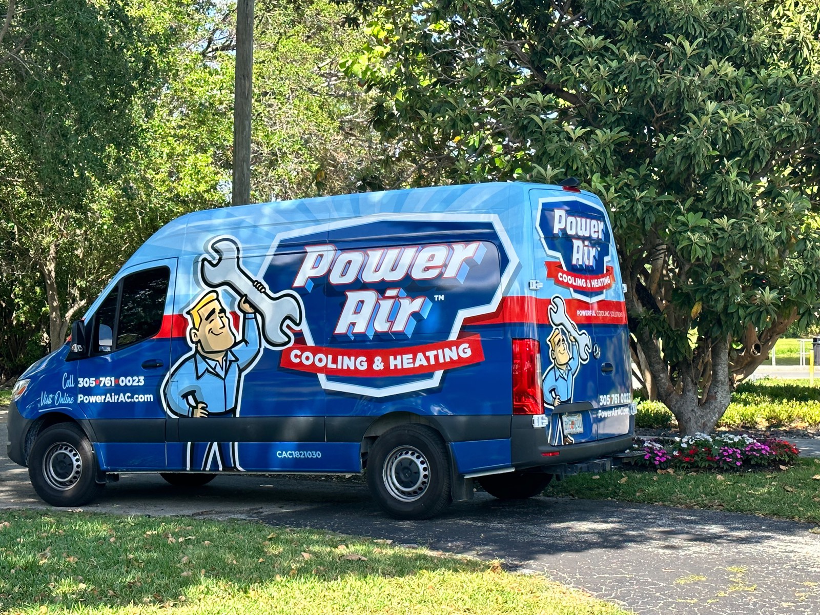 Power Air service van parked in a South Florida residential neighborhood
